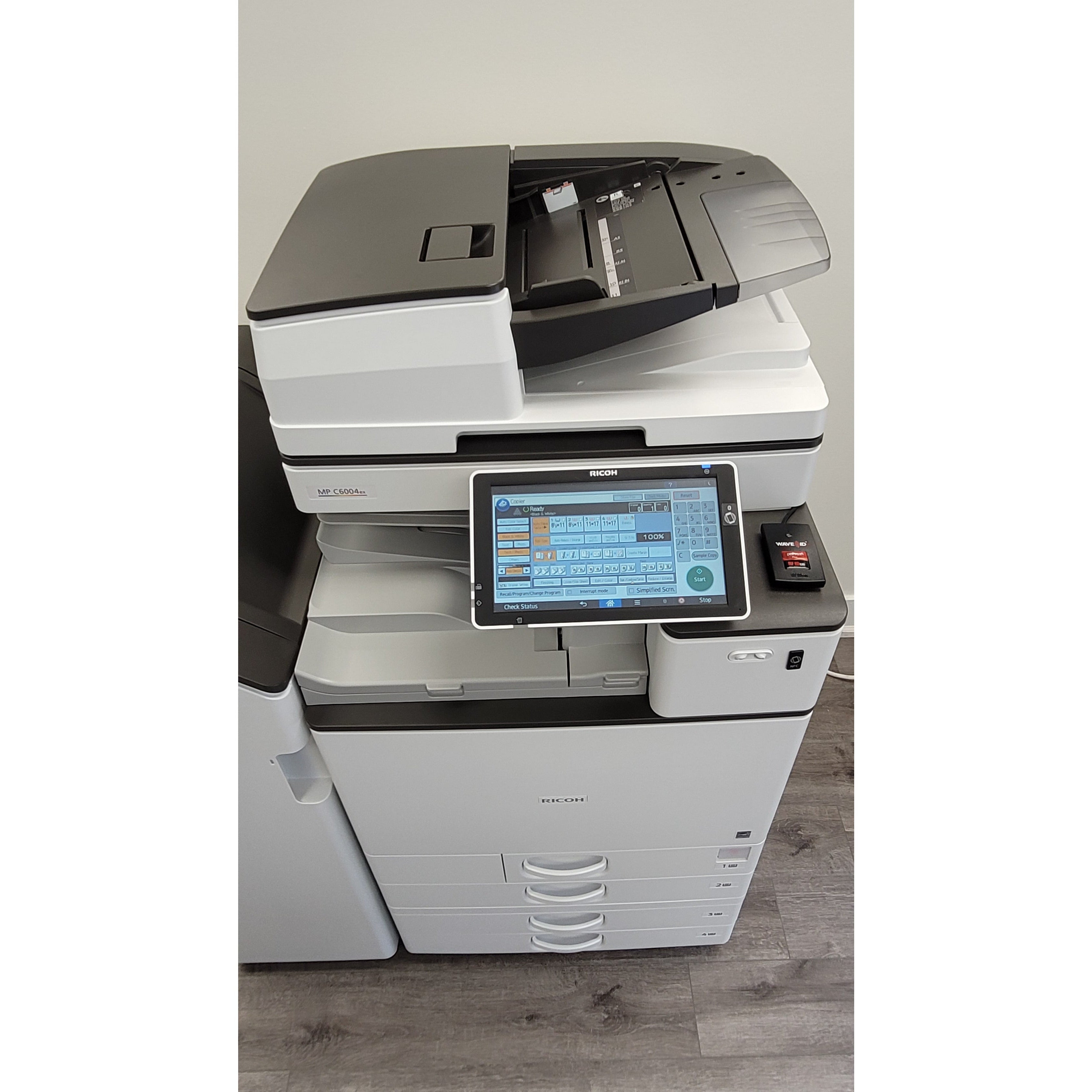 Pre-Owned Ricoh MP C6004EX Multifunction Color Laser Printer 11 x 17,  12 x 18 Paper Size 4 Trays